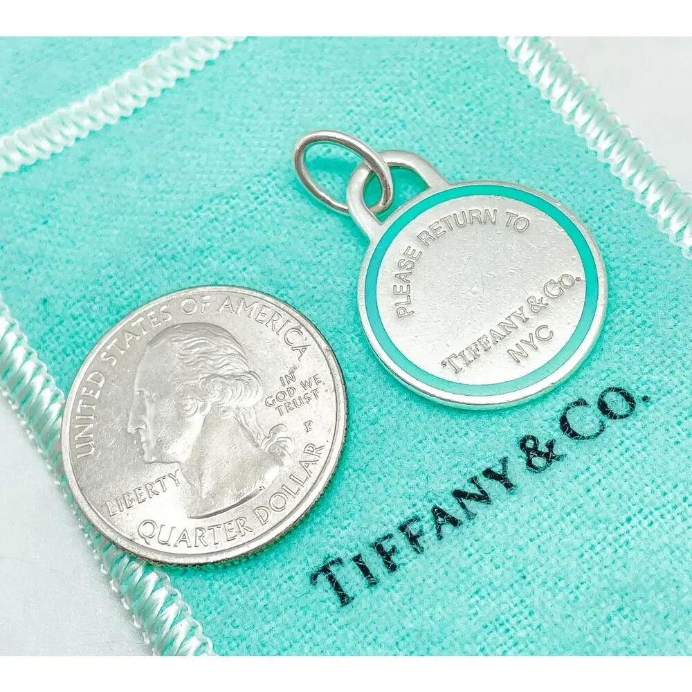 Tiffany & Co. Return to Tiffany Blue Enamel Border Round Charm Pendant Sterling